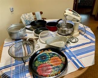 Kitchenware, vintage mixer & bowl, misc. pots, pans, strainers, hand mixer, wooden tray, Vintage aprons, Table cloth