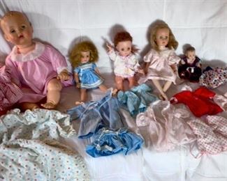 Vintage dolls whose eyes open and close and doll clothes 1950-60's