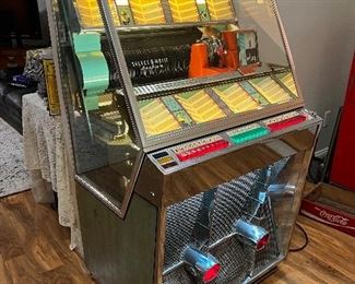 Late 1950's Seeburg Select-O-Matic High Fidelity 160 Model 161S Jukebox with Cadillac fenders including over 100 45's installed in working condition.