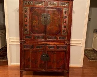 Antique Chinese red lacquer carved cabinet 