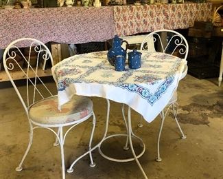 Vintage glass top metal table with two chairs 
