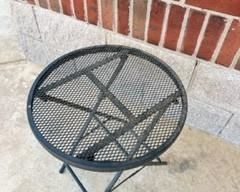 Small round painted metal side table for outdoors