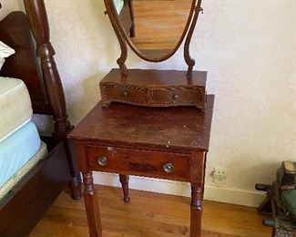 Sheraton Shaving mirror on top of early one draw table