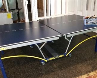 folding ping pong table on wheels, by Stiga