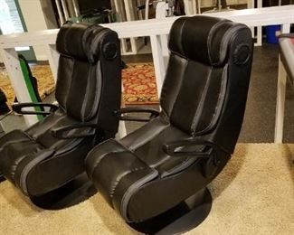 pair of XRocker gaming chairs