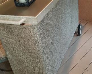 mesh fabric chairs and matching bar on wheels