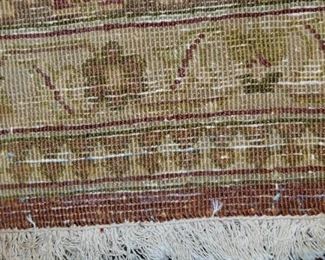 living room rug: 188" x 137", back pictured