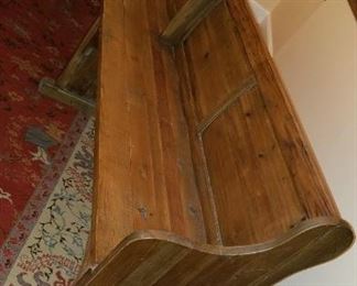 large dining table, with upholstered chairs and bench seating, by Arhaus Furniture