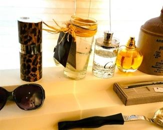 Perfume, designer sunglasses