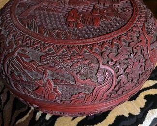 A very large, very rare carved cinnabar lacquer circular box and cover, Ming dynasty, Hongwu period (1368-1398)
This box is valued at more than $10,000