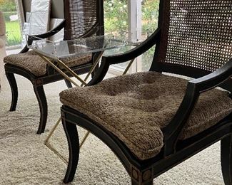 Very expensive Corzine caned arm chairs in black and gold…absolutely never used 