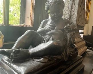 Reclining cherub Italian antique bronze