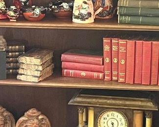 Clocks, antique books, Putti bookends