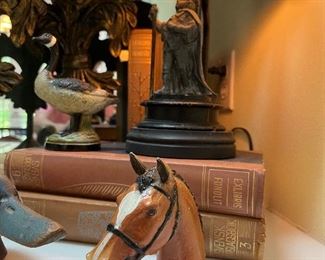 Antique bottle openers and English spelter lamp