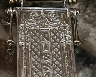 Massive sterling and gold pendant… Jehovah-nissi (Hebrew: יְהוָה נִסִּי‎ Yahweh nissî) is the name given by Moses to the altar which he built to celebrate the defeat of the Amalekites