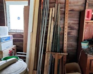 Lumber and metal fencing posts