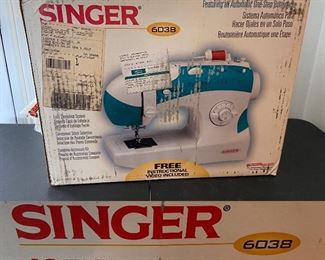 New in Box Singer Sewing Machine #6038
Automatic One Step Buttonhole 