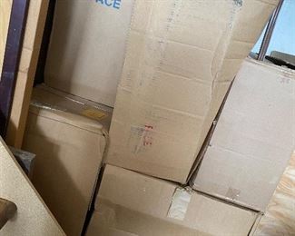 Boxes of brand new cabinets 