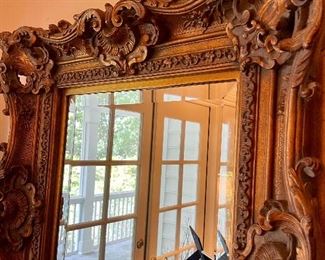 Beautiful mirror over grand piano