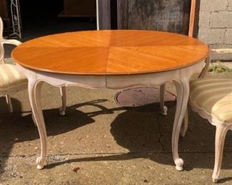 2 tone French cabriole leg dining table w/ 2 extensions.  6 matching chairs: 2 arm shown w/ 2 armless that match, & 2 similar but the same fabric
