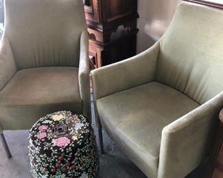 Brayton International pair of arm chairs covered in celadon mohair.  Pair of Brazilian side table shown behind. 