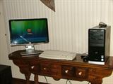 Hewlett Packard Pavilion Desk Top Computer with Windows 7 loaded, Flat Screen Monitor, wireless keyboard (not shown) and wireless mouse