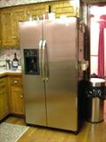 GE Stainless Steel 25 Cu. Ft. Refrigerator, with water and ice dispenser, and water filter. Big & Beautiful!