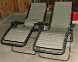 These are two awesome folding outdoor chaise lounge chairs.