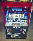 Really fun slot machine, just like in 'Vegas, works like a charm and comes with tokens