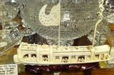 Another fabulous feat of engineering.  Woolie Mammoth ivory carved boat - amazing detail.