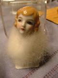 How Cute is this?  It's an old powder puff with a china head.  Great Shape!