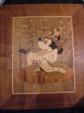 This is an inlaid Mickey Mouse Wall Sculpture...very cool!