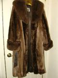 You should come to our sale, if only to feel this amazing fur.  I could pet it all day, it feels THAT great.