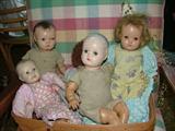 Scary looking dolls that need some TLC.  They look like those dolls that the crazy kid in Toy Story tortured!