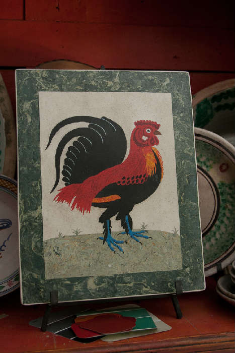 This spunky game cock is a fine example of "scagliola", a peculiar art form born in XVI Century Tuscany, imitating the semi-precious stone inlays created by the Medici family.  This is just one of the scagliola pieces available, and they are all amazing.