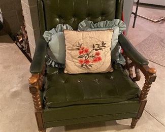 Green leather chair decorative pillows