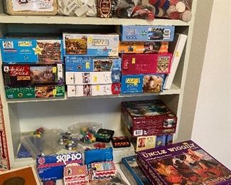 Puzzles uncle wiggly Winnie the Pooh Skip Bo playing cards Uno Domino’s poker chips