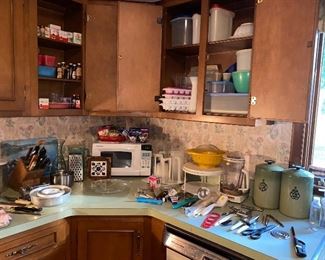 Green mid century canisters, Tupperware and storage, pyrex, vintage Pyrexx, microwave, knives, utensils, every day kitchen necessities