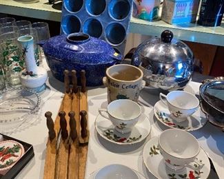 Cardinal tea cups mug rack L.L. Bean cast-iron pan enamel muffin tin Penguin ice bucket Holly and berries glasses candlewick