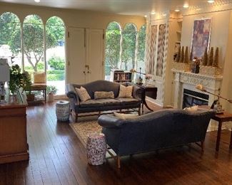 Pair of leather sofas - sold separately 