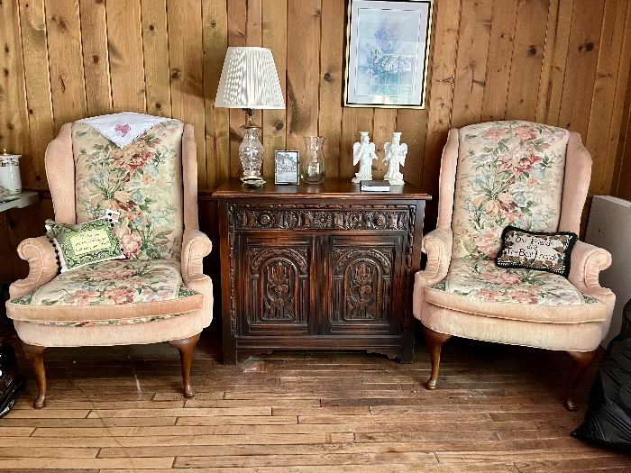 Two matching wingback chairs and beautiful mission carved buffet, crystal lamp, Angel candle holders.