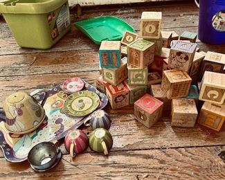 Tin child tea set and lots of wooden alphabet blocks. 