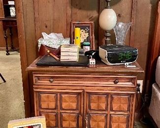 Matching bedside table by White Fine Furniture Co., Vintage Effanbee Clarence Clown, Dream Machine CD player, three 8 track tapes, crystal vase and more.