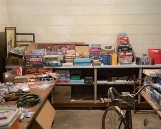 Pictures, picture frames, Christmas puzzles, books, games,  a few cd's, VHS tapes 