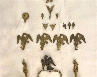 Brass eagle hooks and other brass items