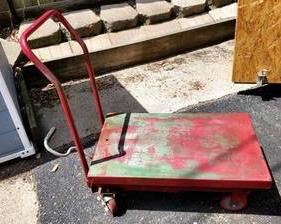 Rolling Table Jack Stand in good used condition with some wear including paint loss and slight surface rust. 
