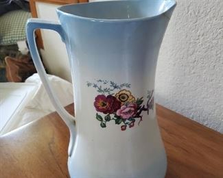 formal painted tall pitcher
