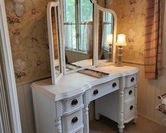 vanity is 32" high x 50" wide x 19" deep; three panel mirror is 38" high x 41" wide