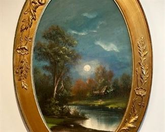 Antique landscape painting in oval frame