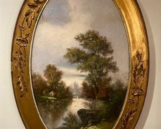 Antique landscape painting in oval frame